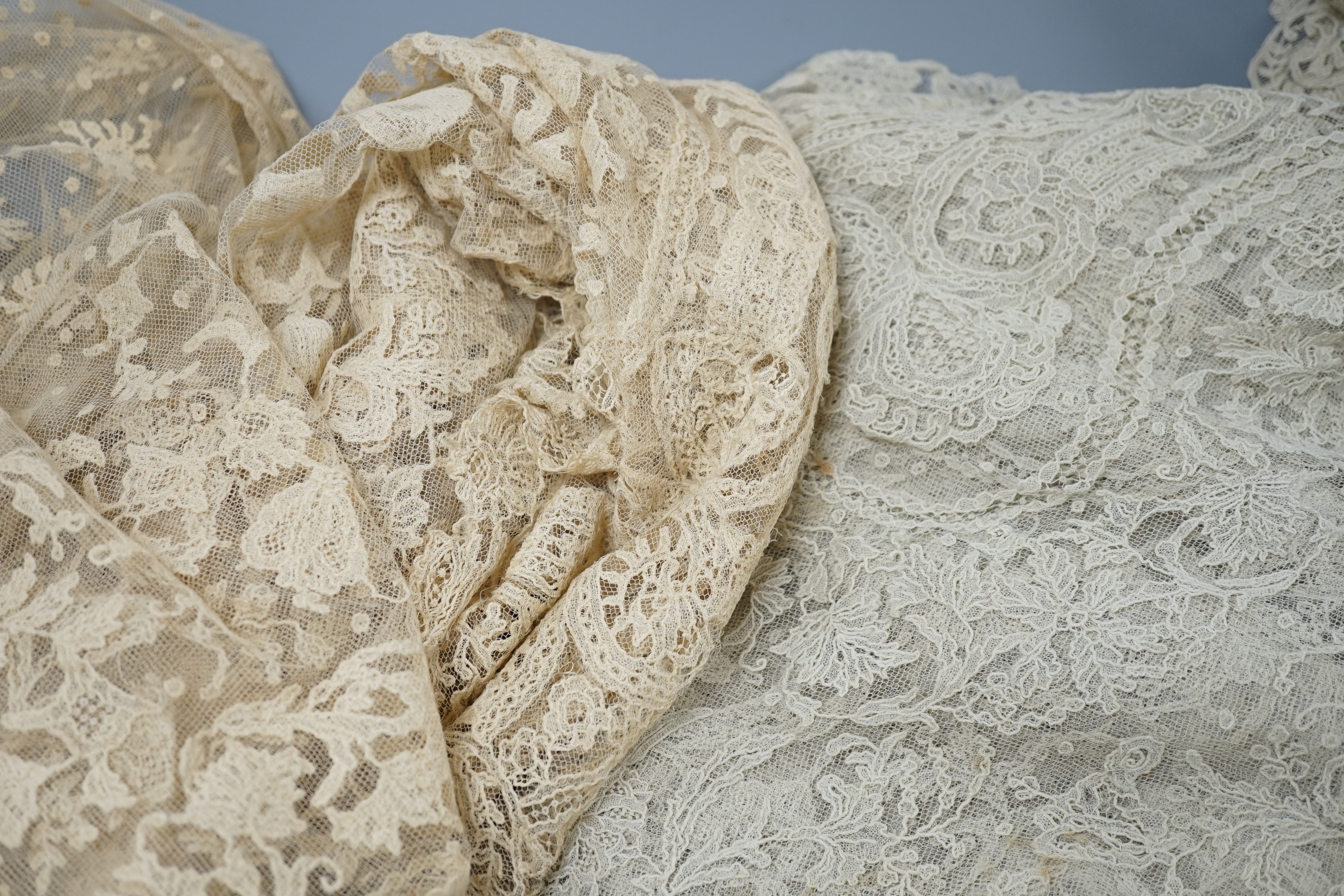 A rare length (9 and a half yards) of Brussels 19th century needle lace, some repairs and damage, circa 1880 and a similar wedding veil